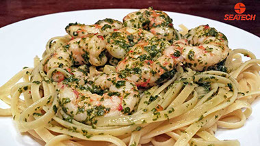 A photograph of Argentine red shrimp chimichurri linguine.