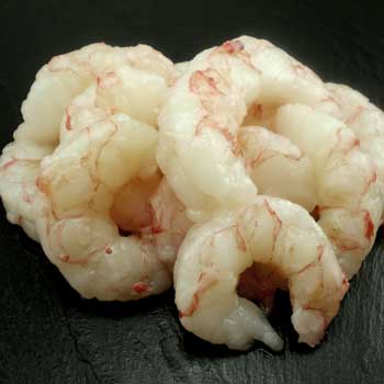 A photo of raw peeled and deveined argentine red shrimp meat.