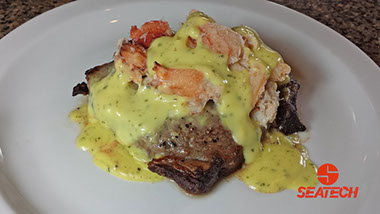 A photograph of crab steak oscar.