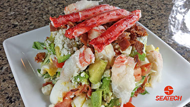 A photograph of Chilean king crab COBB salad.