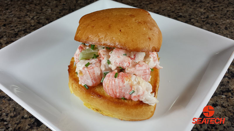 A photograph of a Chilean langostino lobster slider.