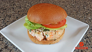 A photograph of a langostino lobster burger.