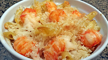 A photograph of freshly made langostino lobster mac and cheese.