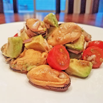 Mussel avocado salad with mussel meat, avocado, cherry tomatoes, garlic, vinegar, basalmic vinegar, olive oil and salt & pepper.