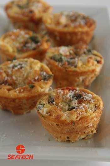 A photograph of slamon florentine crustless quiche.