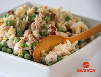 Salmon, Pea & Bacon Orzo Salad A photograph of a salmon, pea & bacon orzo salad.